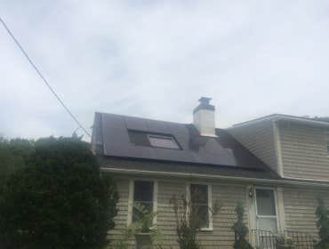 Photos by Plymouth Solar Energy #1 Ground Mounted hillside array