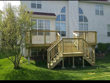 Photos by H&l Master Construction #5 Deck rebuild before and after . Demo old deck with post. Rebuild the deck and apply new post .