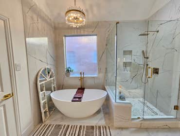 Photos by Trublue of Allen #31 Full master bath remodeling. New shower, bench, niche, frameless glass, freestanding tub, floating vanities, countertops