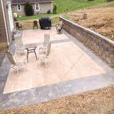 Photo(s) from H & H Chance Llc Two tone walk and drive with fan steps