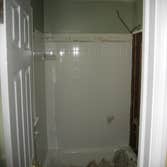 1418 Remington Complete remodel of two small bathrooms for client; using Kohler fixtures and faucets, carrara marble, wainscotting, and Benjamin Moore 