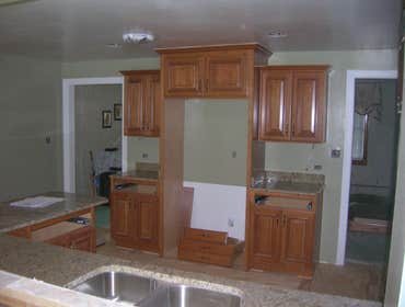 Kitchen Redesign from Inner Circle Concepts This simple kitchen renovation was designed to revamp its original showcased feel with new cabinets and gra