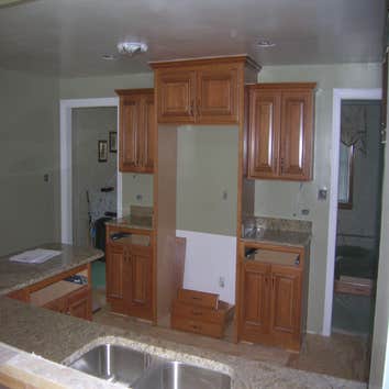 Kitchen Redesign from Inner Circle Concepts This simple kitchen renovation was designed to revamp its original showcased feel with new cabinets and gra