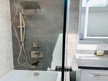 Masculine Master Bathroom Remodel Large Format Tile, Modern Bathroom, Custom Vanity, Waterfall Countertop & Floating Shelves, Brushed Nickel Fixtures F