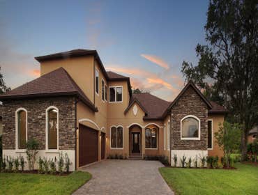 Custom Home in Harmony, FL Custom Single-Family Home with 4 Bedcrooms, 5 Baths, Study, Theater Room, Game Room, Outdoor Living Space and more!