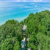 Grand Bluewater Villa Nestled along the shores of Lake Michigan in Harbert, Michigan, this newly constructed home is a testament to refined coastal liv