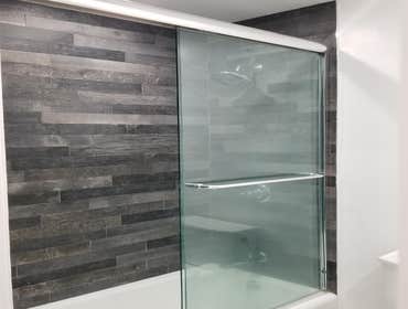 Bathroom and Kitchen Remodel Transitional style White Shaker Kitchen with Ceramic Backsplash and Ceasarstone countertop.
Remodeled both bathrooms,