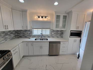 Photos by Handy National Services #1 full kitchen remodel
