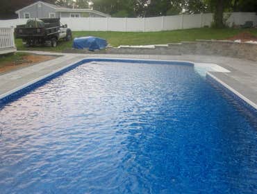 Photos by Dunn Landscape Construction #1 After initial pool installation provide all hardscape including retaining walls, pool deck, walkways and plant