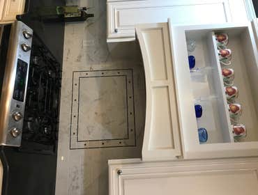 Kitchen Renovation Wellesley, Ma New Counter Top and Tile Back Splash and Custom Built Range Hood. New Crown Molding.