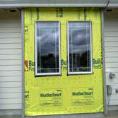 Siding Work Replaced old hardie siding on second level dormers, garage gable ends and first floor wall.