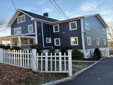 Photos by Bh Interiors #4 Added an extension over an existing flat roof.
All new roof and windows installed.
All new siding and trim work