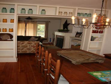 custom built-in shelf passage way in dining/living room