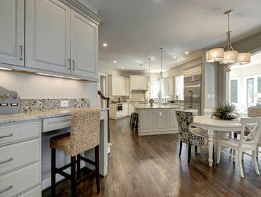 GULICK | CUSTOM Home in McLean The impressive stone and HardiePlank® elevation on our Winthrop really stood out on this corner lot of approximately one
