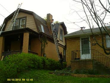 This is a panoramic display of a variety of photos from numerous jobs. We are showing everything from a flat membrane roof to box gutter and chimney re