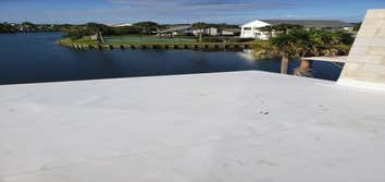 Photos by Morgan Conley Roofing and Repair #2 1/2 inch high density insulation.Tpo, copper eve drip,
