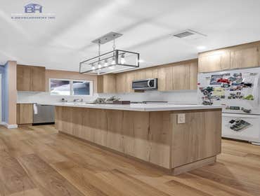 Kitchen & Bathroom This kitchen and bathroom remodel in San Jose features high-quality prefabricated cabinetry, quartz countertops, modern tile finishe