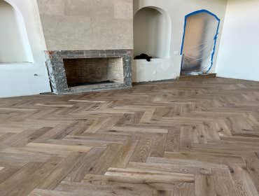 Photos by Ot Flooring Inc #1 Custom herringbone hardwood floor installation with a clean, seamless layout. Precision cuts and detailed craftsmanship cr