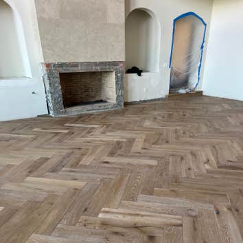 Photos by Ot Flooring Inc #1 Custom herringbone hardwood floor installation with a clean, seamless layout. Precision cuts and detailed craftsmanship cr