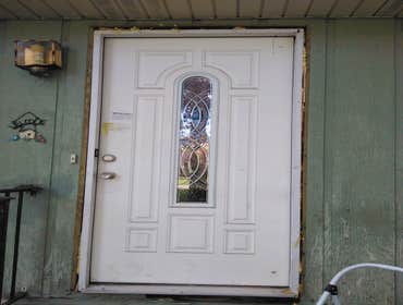 Door - R/R Front/Crawl Space Door - R/R Front with Crawl Space Damage.
Doors - R/R Rear Patio.
