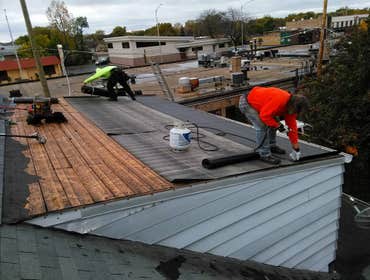 New flat roof Installation of Flat roof, replacing a shingled roof.