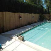 fence photos from JCS Builders Inc pressure treated and red cedar wood, chain link , vinyl / pvc and ornimental
