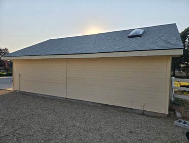 Garage Repair - Boise ID Client Backed trailer into garage.
Replaced Siding, Paint, Roofing Materials, Shattered Door glass.