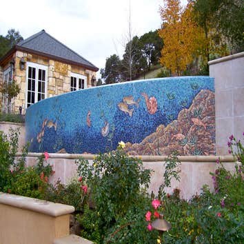 Alta American Pools Inc Project Downhill side of infinity edge pool. 1"x1" glass tiles set in a mosaic pattern