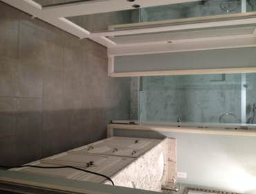 Alameda bathroom remodel Complete tear out of tub and vanity area. Replace with 5 foot shower with seat. New floor tile throughout bathroom and vanit