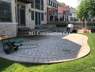 Photos by M3 Construction Co #2 Full Gazebo kit build with concrete footings poured in between brick pavers. Custom tv mount, cieling fan, outlets and 