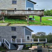 Historic Stone Barn Exterior & Deck Renovation Deck reface and exterior upgrades for a 100+ year-old stone barn conversion in Mechanicsburg, PA. The ex