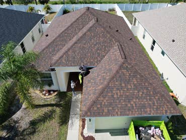 Photos by WOODSTONE ROOFING