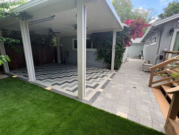 Photos by Ocean Remodel Inc #9 Backyard remodel in Menlo Park with fishbone pavers, artificial turf, low-voltage lighting, and a covered patio with hea