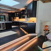 Photos by Dreyer Electrical #2 Kitchen, & Living room remodel with accent lighting. Above & under cabinet lighting, toe kick lighting, and accent ligh