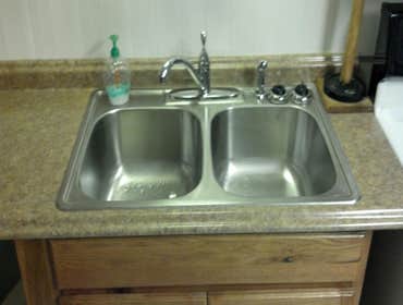 Photo(s) from Adkins Services New kitchen sink and Faucet and Appliance... Disclaimer: The Appliance are from when i worked for another company, but st