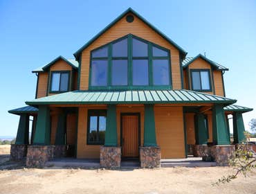 Rustic Home Construction by Built To Last Inc.