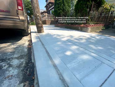 Jamaica Queens Sidewalk Reaplcement This gorgeous two-story home is located in prime Queens NY and features new installed concrete sidewalk With a Old