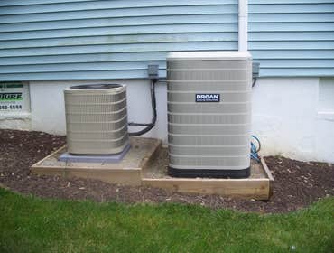 Rancher with split level dual system install Installed 1.5 ton, 14 seer split system with heat coil for addition and 2 ton 16 seer split system in exis