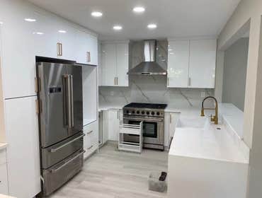 Photos by Pan Shi Construction Inc #1 Converted an existing garage into a fully functional Accessory Dwelling Unit (ADU), The project included framing 