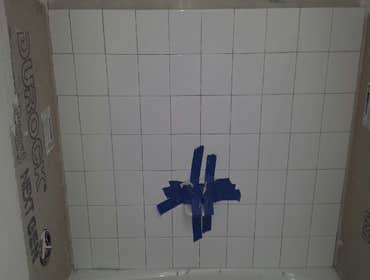 Project photos from L Davis Enterprise Inc/Davis Group Bathrooms floor tile surround tile and all types of wall tile