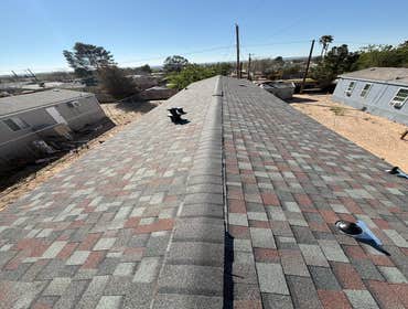 New architectural shingle roof deployment in progress