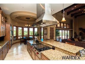 Photos by Sequoia Homes LLC #1 This Tuscan/Mediterranean style home is truly one of Mohave County's finest luxury homes. Over 1 acre of property in the