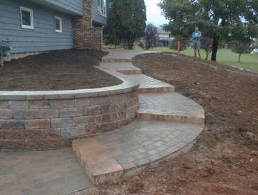 Raised walkway and retaining