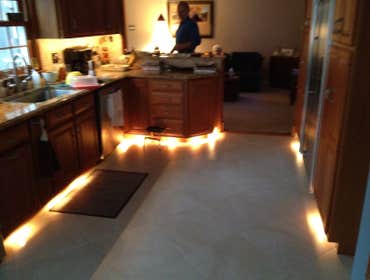 Toe kick lighting. i installed under cabinet lights in this kitchen and toe kick lights, using Progress lighting under cabinet lights.