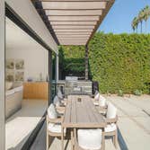 ADU Conversion We transformed an unused backyard and garage into a beautiful oasis for a client. A welcoming open floor plan with custom white oak pane