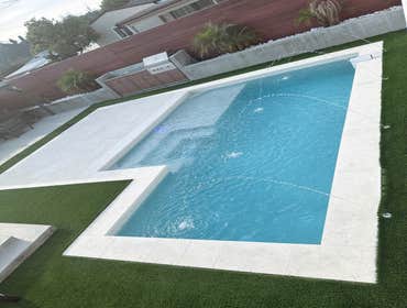 Photos by American Way Remodeling #1 New construction underground swimming pool.