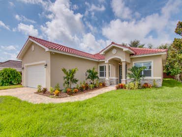 Palm Harbor Custom Home We completed this custom mediterranean-style home in late 2019. This project featured stunning high coffered ceilings, porcelai
