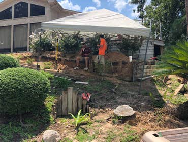 Photos by Bencro Mechanical #3 Buyers project.
Replaced a retaining wall. Increased water control behind the wall to prevent failure again.