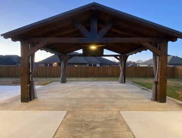 Photos by Dupont Technical Services #1 Kazeebo power. W fan added, motorized TV ceiling mount w 5 receptacles. And recess outdoor lighting.