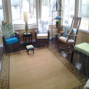 sun room 16x16 concrete slab with 8" lap siding.